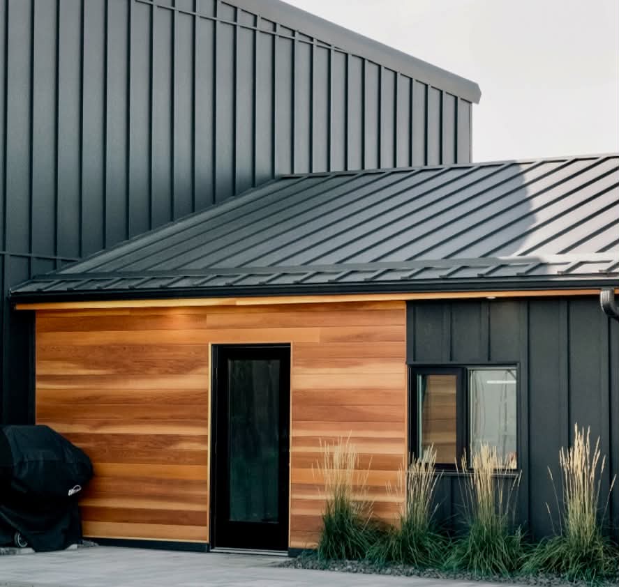 Steel siding with board and batten profile